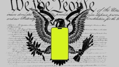 Smartphone with yellow screen overlayed on US Constitution and eagle.