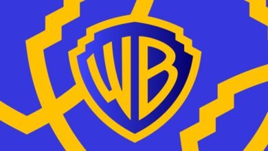 Warner Bros. logo in gold on a blue background.