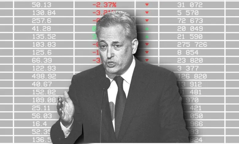 David Sacks speaks against a stock market data background.