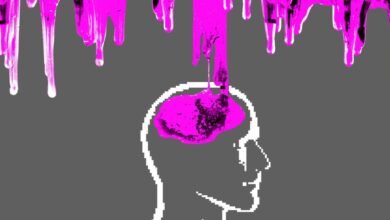Pixelated head outline with pink paint dripping onto the brain area.