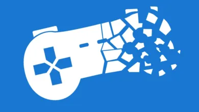 White game controller icon breaking apart on blue background.