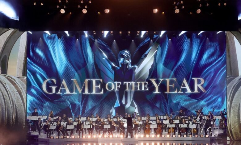 Orchestra performs at The Game Awards with 'Game of the Year' on screen.