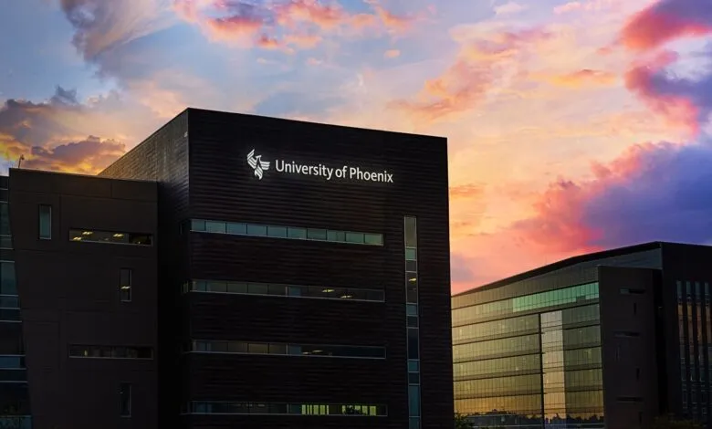 University of Phoenix building exterior at sunset with colorful sky.