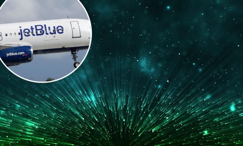 JetBlue airplane overlaid on abstract green light burst background.