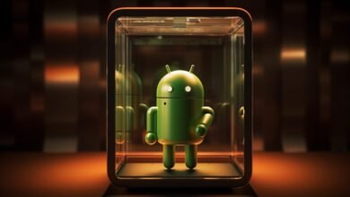 Android robot figure inside a glass display case.