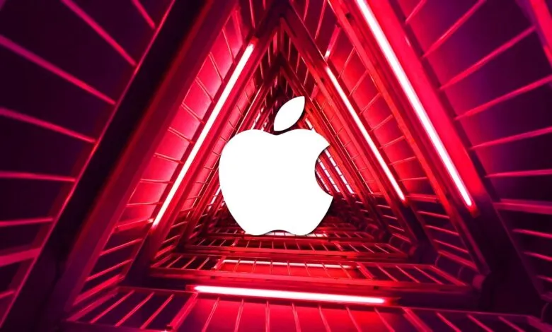 Apple logo in a red triangular tunnel, perspective view.