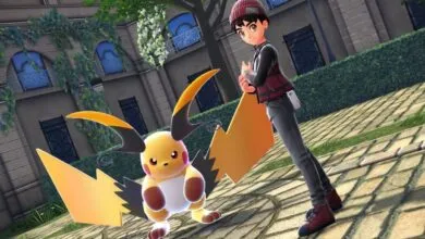 Pokémon trainer stands with Alolan Raichu in a park setting.
