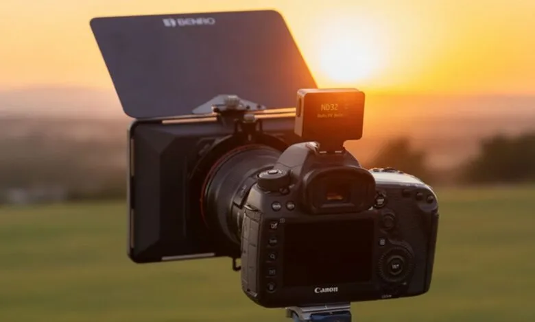 Canon camera with Benro matte box and ND filter capturing a sunset.
