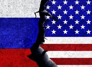 Cracked image showing the flags of Russia and the United States.