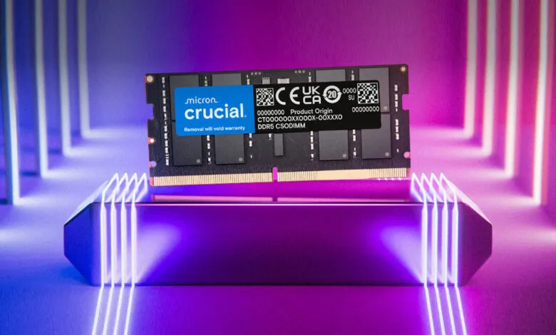 Crucial DDR5 RAM module on a futuristic platform with neon lighting.