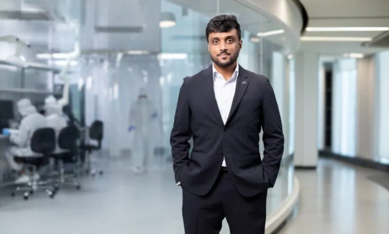 Anirudh Sharma, Digantara CEO, poses in a modern lab setting.