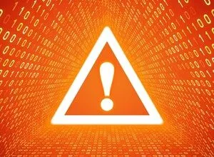 Warning sign with exclamation point against a binary code background.