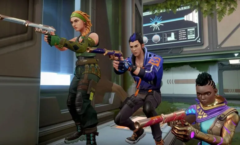 Three Valorant agents, Skye, Yoru, and Phoenix, aim their sidearms.