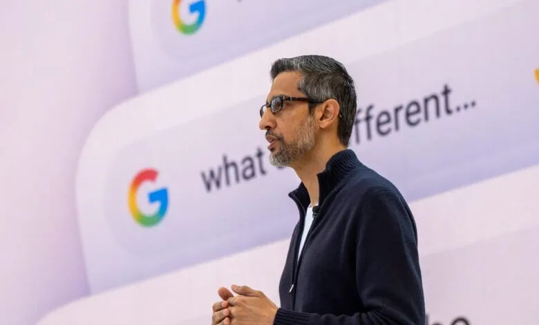 Sundar Pichai speaks in front of Google search results backdrop.