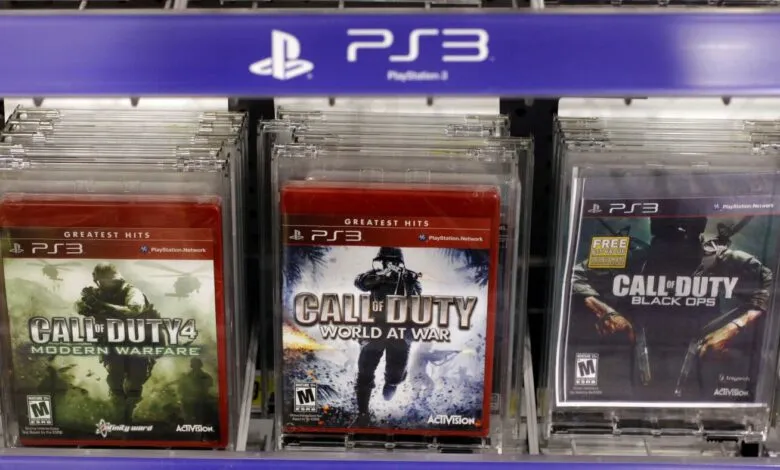 Call of Duty PS3 games on a store shelf, including Modern Warfare and Black Ops.