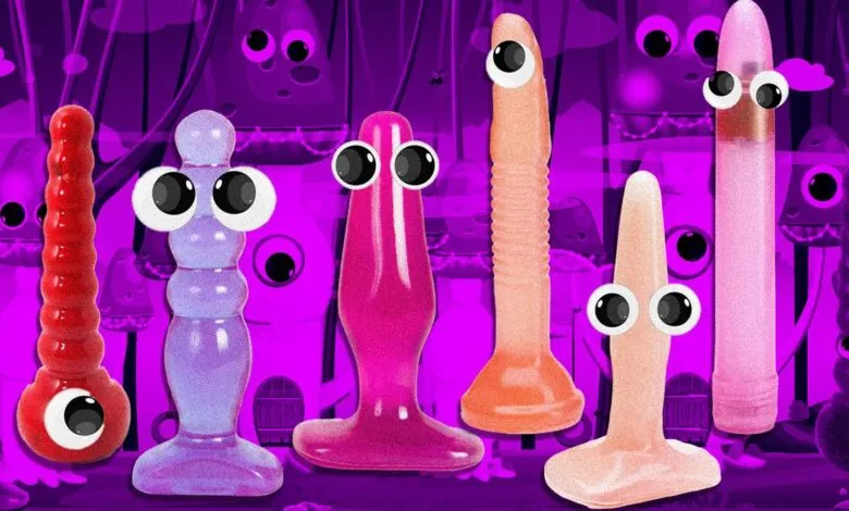 Colorful adult toys with googly eyes stand against a purple cartoon background.