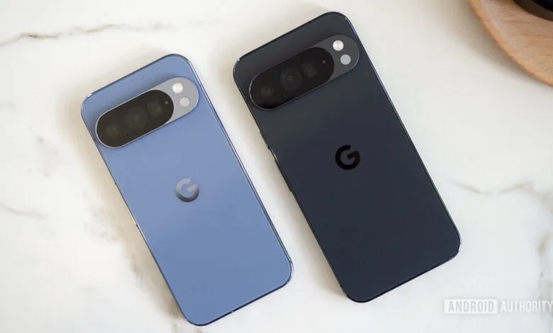 Two Google Pixel phones, one blue and one black, on a marble surface.