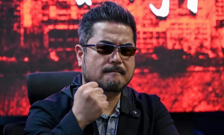 Katsuhiro Harada, Tekken producer, poses with a determined expression.