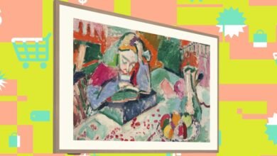 Framed painting of a woman reading on a TV screen, set against a colorful background.