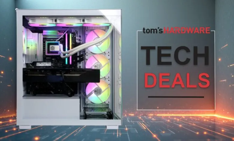White computer case with rainbow RGB fans and components visible through the glass side panel.