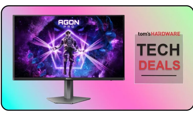 AGON Pro gaming monitor displaying a character in a purple space scene.