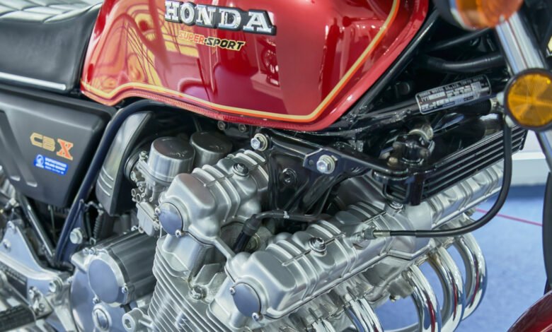 Close-up of a red Honda CBX Super Sport motorcycle engine.