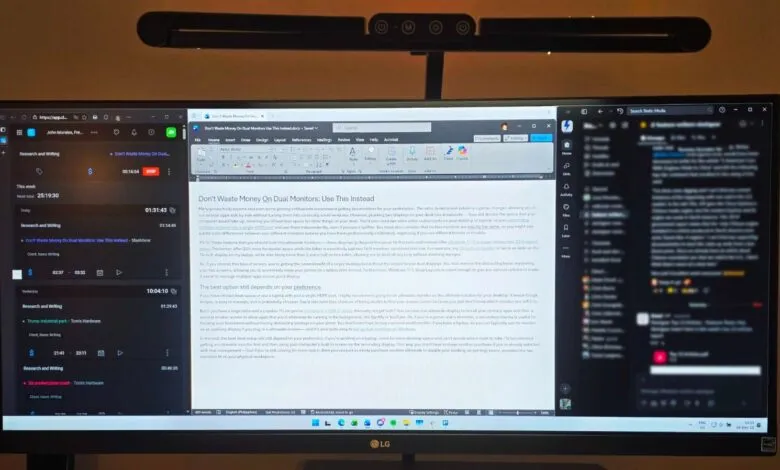 Ultrawide monitor displaying productivity apps and a document, illuminated by a monitor light.