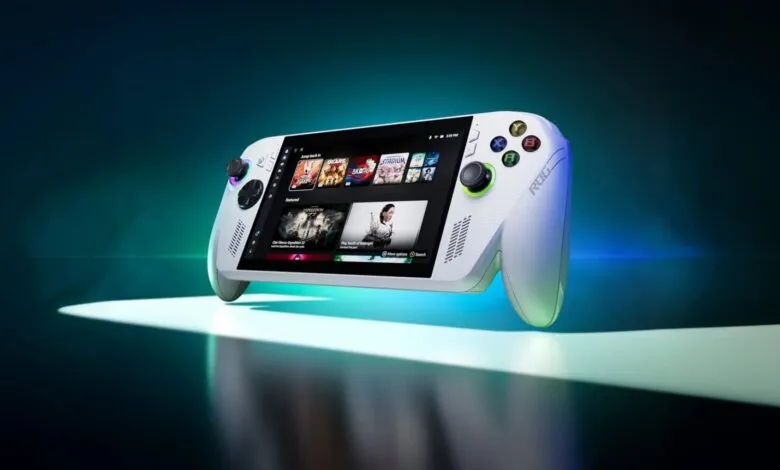 White ROG Ally handheld gaming console on a spotlighted surface.