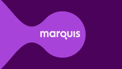Marquis logo in white on purple background.