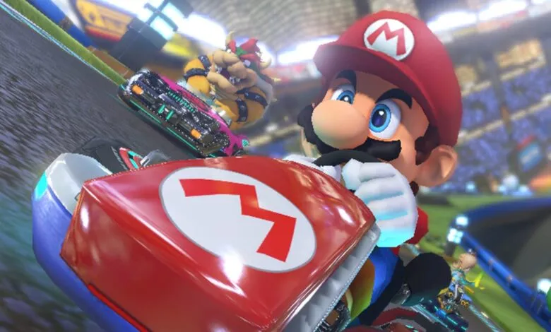 Mario Kart race featuring Mario and Bowser on a vibrant track.