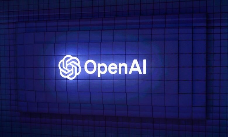 The OpenAI logo glows against a textured blue wall.