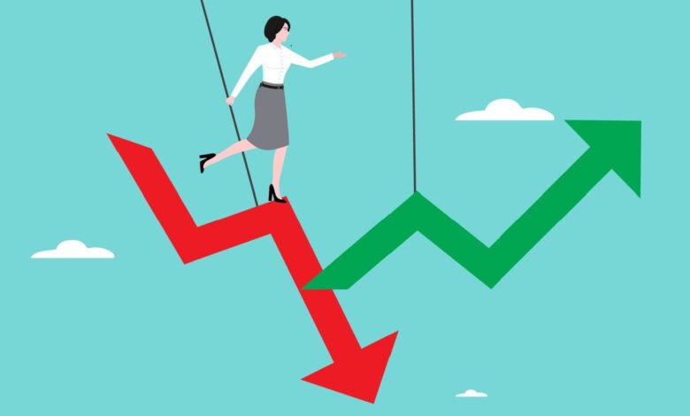 Woman balancing on downward red arrow towards upward green arrow.