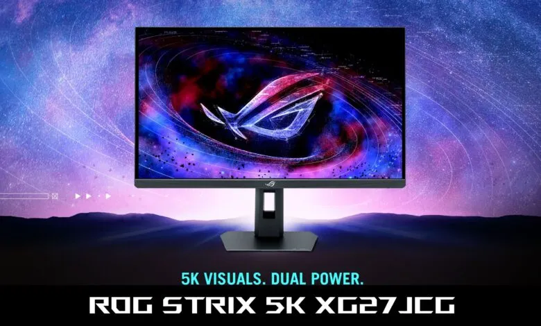 ROG Strix 5K XG27JCG monitor displaying a nebula-like image with the ROG logo.