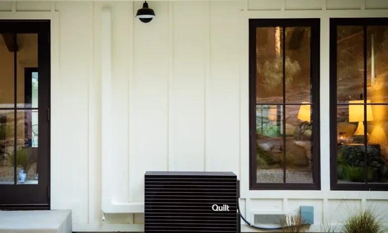 Quilt outdoor unit sits outside a modern farmhouse-style home.