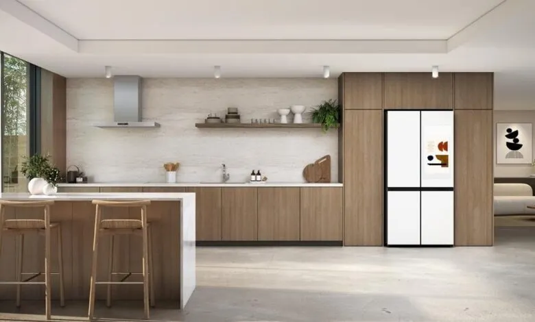 Modern kitchen featuring a white Samsung Bespoke refrigerator.