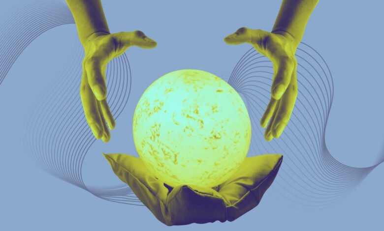 Two hands hover over a glowing orb resting on a cushion against a blue background.