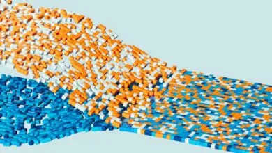 Abstract pixelated wave pattern in orange, white, and blue hues.