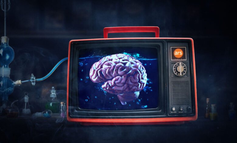 Retro TV displays brain in water, connected to lab equipment.