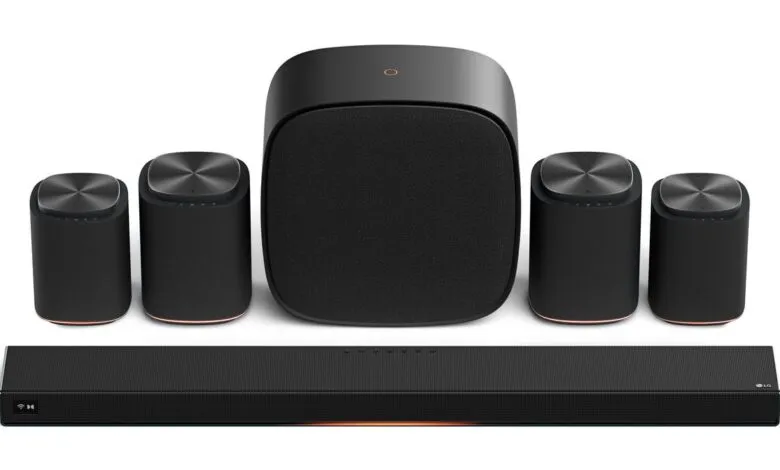 LG sound system with soundbar, subwoofer, and two satellite speakers.
