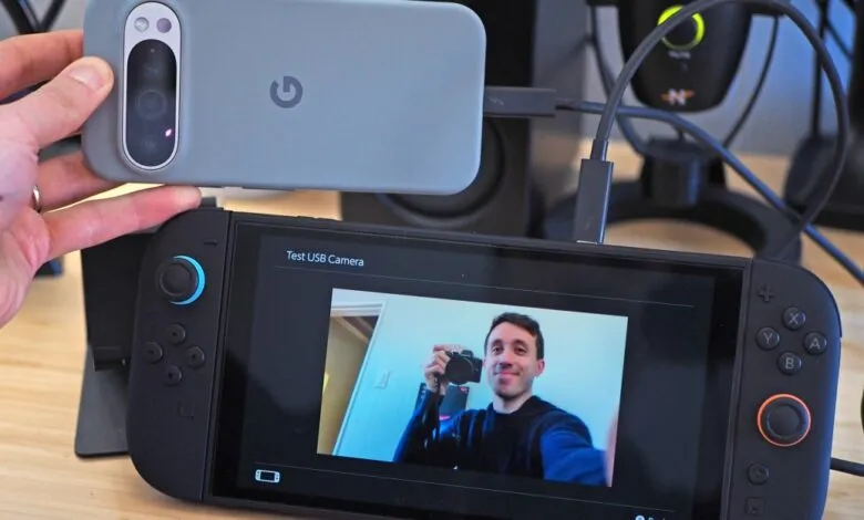 Pixel phone used as webcam for Nintendo Switch, showing a man's face.