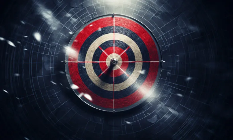 Target with red, black, and beige rings, bullseye in center.