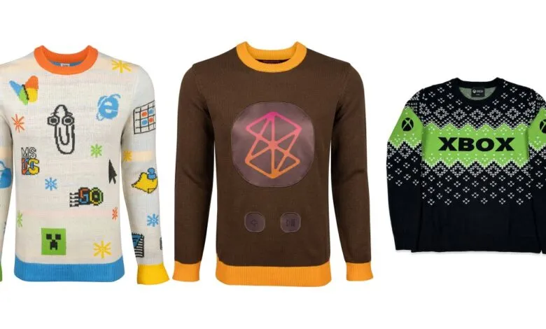 Three novelty sweaters: one with retro Microsoft icons, one ZeniMax, and one Xbox.
