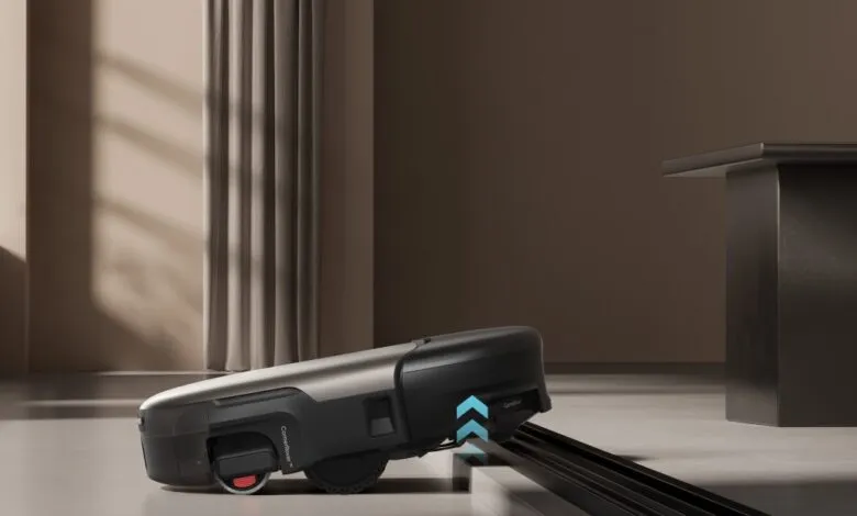 Robot vacuum cleaner navigating a step with ease.