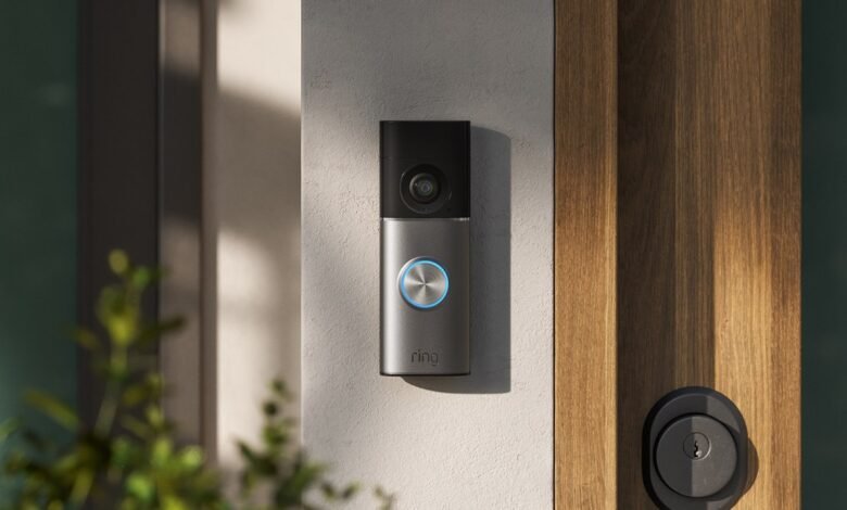 Ring Pro 3 doorbell mounted on wall next to front door.