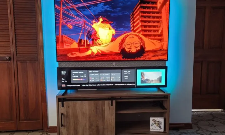Smart TV displaying anime scene with vibrant red and blue backlighting.