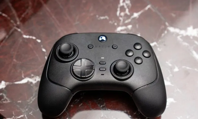 Close-up of a black Razer Wolverine V3 gaming controller.