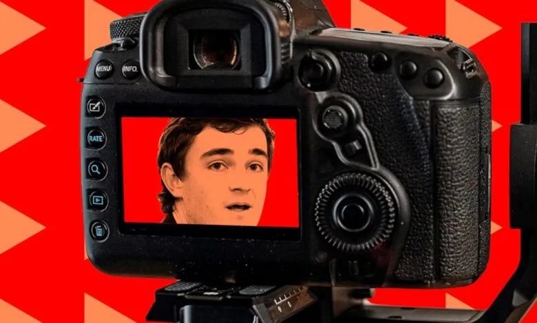 Camera screen displays Nick Shirley's face against a red triangle background.