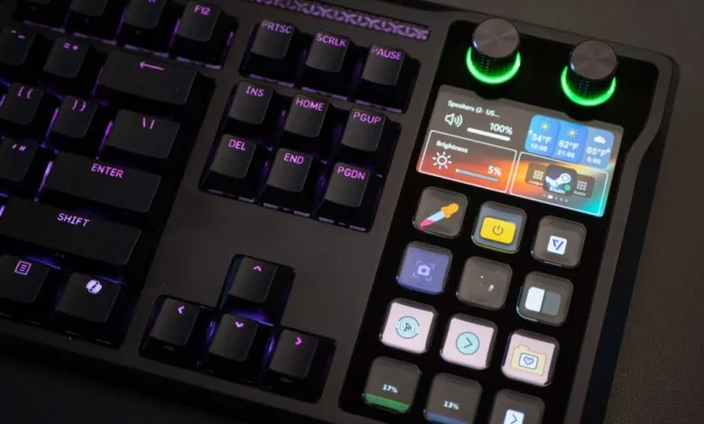 Corsair keyboard with integrated LCD screen and customizable shortcut buttons.