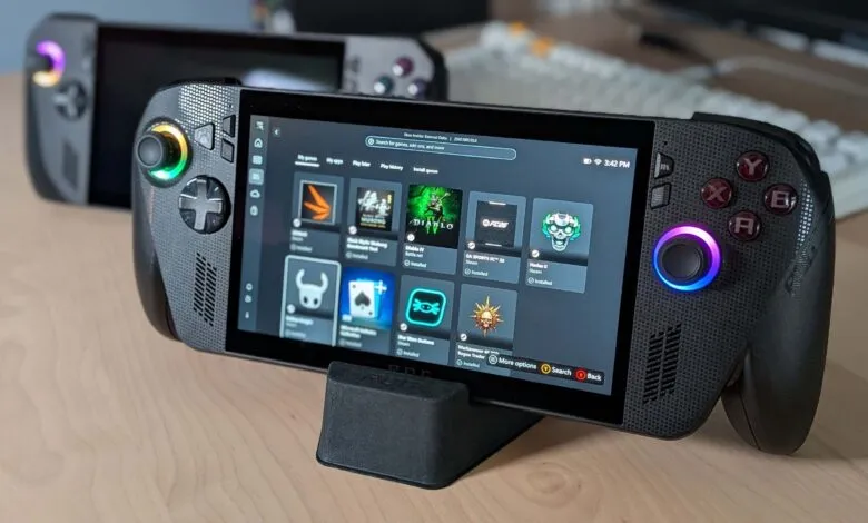 ROG Ally handheld gaming console displaying installed games on screen.