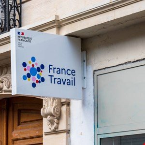 France Travail sign on a building, indicating a French government employment agency.